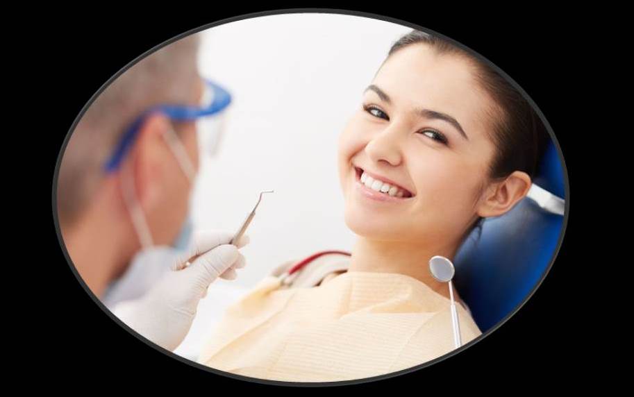 Patient sitting in dental chair